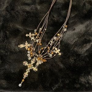 Brown faux leather with gold cross necklace